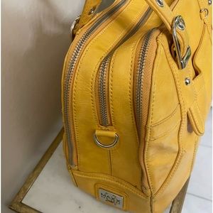 Vibrant color shoulder purse with hardware details